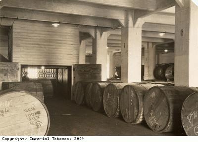 Delivery floor with barrels of tobacco
