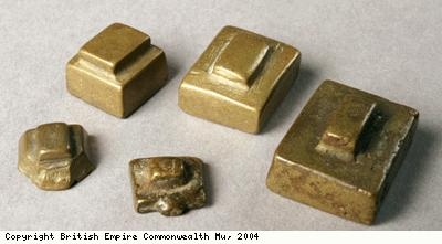 Weights used for measuring gold dust